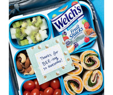 Welch's Mixed Fruit Fruit Snacks in a lunch box with fruit and roll-ups