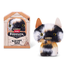 Calico cat plush with yellow eyes and jagged teeth next to Fuggler display box