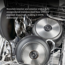 Nonstick skillet and lid with stainless exteriors in dishwasher racks