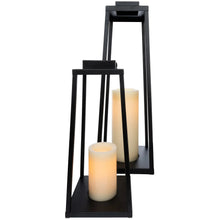 Two black LED lanterns with frosted pillar candles
