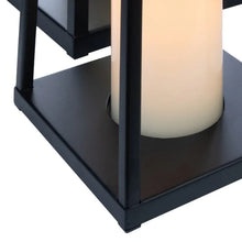 Black lantern base with frosted pillar candle inside
