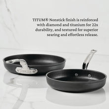 Nonstick skillet with lid; dark cooking surface, stainless rim, and side handles