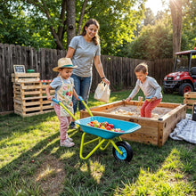 Kids metal wheelbarrow with blue tub and green frame, used for yard play