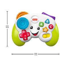 Green-and-white learning controller toy with blue, red, and letter-number buttons