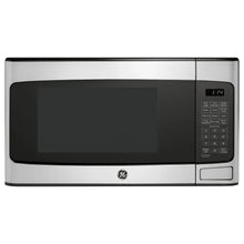 GE countertop microwave oven with black door, digital display, and keypad controls