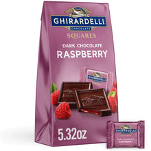 Dark chocolate raspberry squares bag with a foil-wrapped bar and raspberries