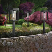 Solar pathway lantern light pair with clear glass panels and warm lit LED filament