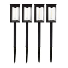 Set of 4 black solar pathway lantern lights with clear glass and ground stakes