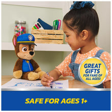 Chase take-along buddy plush on a tabletop, brown fur and blue uniform