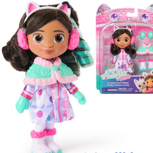Sweetest Treat Gabby doll with cat-ear hood, pink earmuffs, teal-and-pink winter outfit
