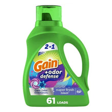 Green liquid laundry detergent bottle with handle and 61 loads label