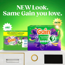 Laundry detergent pacs boxes side by side, new look moonlight breeze theme