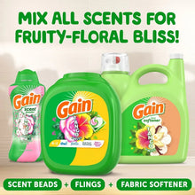 Three laundry care products arranged together with flings, scent beads, and fabric softener icons