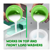 Green jug pouring white liquid fabric softener from the spout