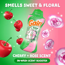 Laundry scent booster beads bottle with cherry + rose scent graphic in green and pink