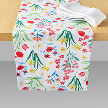 Floral table runner with colorful garden flowers on white background
