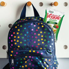 Garden Veggie Straws sea salt bag beside colorful polka-dot mini backpack