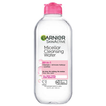 Micellar cleansing water bottle front view with pink cap