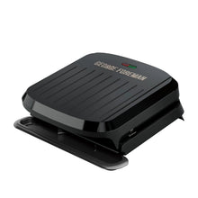 George Foreman grill and panini maker, black closed with ridged top plate