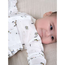 Preemie long-sleeve top on baby in ivory animal print with matching fabric pants