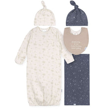 Baby gift set pieces: knotted hat, long-sleeve gown, bib, and swaddle blanket