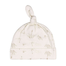 Cream baby knotted hat with botanical print and covered top knot