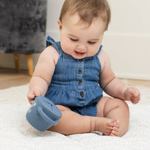 Baby holding a light blue snack cup with lid; 'GET IN MY BELLY' on the side.