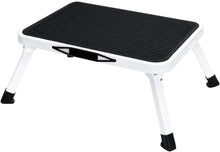 Foldable 1-step stool with black non-slip platform and rubber feet, carry handle.