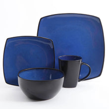 Blue square stoneware dinner plates with dark mug and bowl