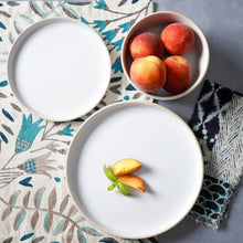 White coupe dinner plate and small bowls with fruit, dinnerware set piece