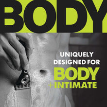 Men’s body razor held in hand with cartridge head pressed against skin