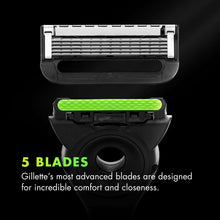Men's manual razor with 5-blade head and exfoliating bar, close-up