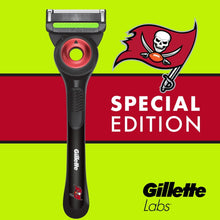 Men's Gillette Labs razor handle with red shaving cartridge, front view.