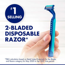 Hand holding blue disposable pivot razor with 2-blade design