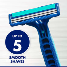 Blue disposable razor with teal lubrication strip cartridge