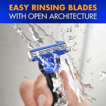 Blue refillable razor with blade cartridge rinsed under running water.