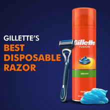 Gillette Sensor5 disposable razor with blue handle beside orange shaving gel bottle