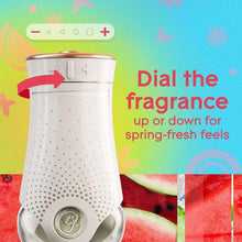 White plug-in scented oil warmer with dial knob and speckled diffuser base