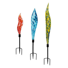 Set of 3 glass garden stakes with blue, red, and yellow swirled glass tops and tines.