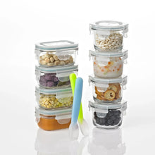 Baby food glass container set of stacked clear jars with mixed ingredients