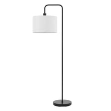 Matte black floor lamp with cylindrical white linen shade and round base