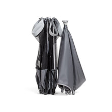 Folded gray mesh playard canopy and panels with compact storage bundle