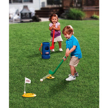 Kids golf grab-and-go set with blue bucket and green club, yellow targets on grass