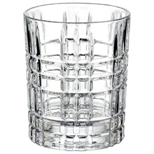 Clear faceted whiskey chiller tumbler with ridged glass texture