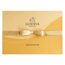 Gold chocolate gift box with ribbon bow and Godiva logo