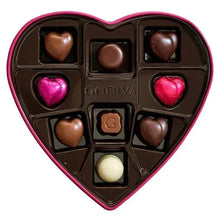 Heart-shaped chocolate box with assorted heart and truffle candies