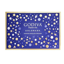 Closed assorted chocolate box with blue gold-speckled design and Godiva logo