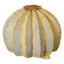 Ribbed barrel torch sculpture in white metal with gold streaks and rusted flower cap