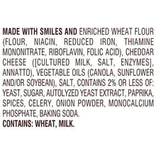 Cheddar baked snack crackers ingredients list on box, includes wheat and milk