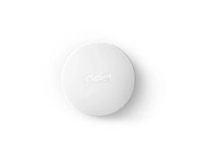 Smart temperature sensor disc in white with nest logo